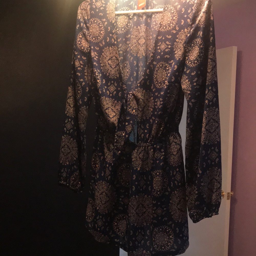 Long sleeve romper.